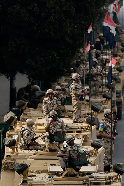 Egyptian army soldiers take their positions on top and next to their armore