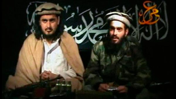 File still image taken from video shows Taliban leader Hakimullah Mehsud sitting beside another man
