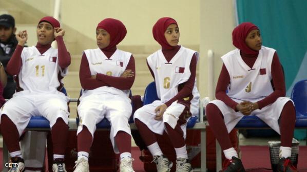 Qatari players wearing Islamic sportswea