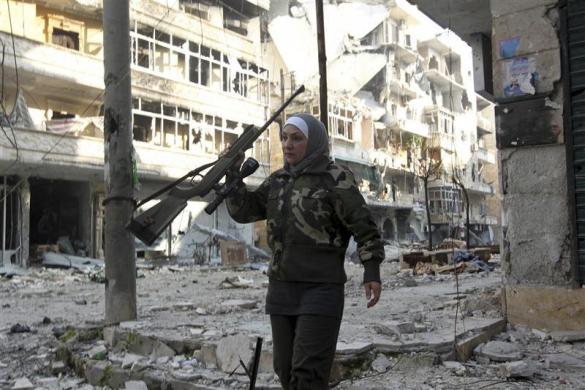 Guevara, a Syrian Palestinian woman married to an Al Wa'ad battalion commander, is pictured in Aleppo