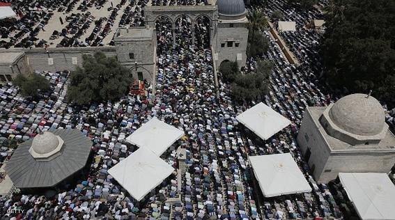 A picture taken from the minaret of a mosque shows Palestinian Muslim worshipers praying in the Al-Aqsa Mosque compound in Jerusalem during the second  Friday prayer of the holy month of Ramadan, on June 26, 2015. AFP PHOTO/AHMAD GHARABLI        (Photo credit should read AHMAD GHARABLI/AFP/Getty Images)