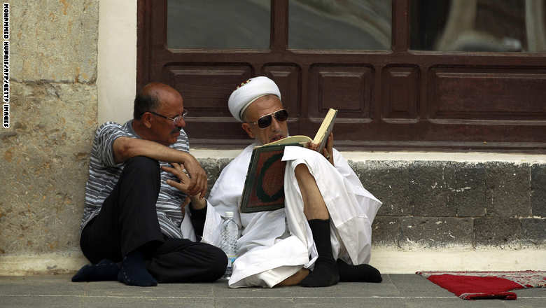 Yemeni Muslim worshipers read the Koran, Islam's holy book, during the fasting month of Ramadan on June 21, 2015, at the Great Mosque in the old city of the capital Sanaa. AFP PHOTO / MOHAMMED HUWAIS         (Photo credit should read MOHAMMED HUWAIS/AFP/Getty Images)