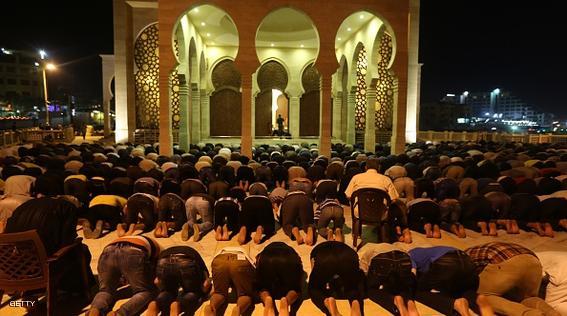 Palestinian people take part in a prayer called Tarawih, on the eve of the holy fasting month of Ramadan in Gaza City, on June 17, 2015. More than 1.5 billion Muslims around the world will mark the holy month which begins this week. Ramadan is the ninth month of the Muslim lunar calendar during which observant Muslims fast from dusk to dawn. AFP PHOTO / MAHMUD HAMS        (Photo credit should read MAHMUD HAMS/AFP/Getty Images)