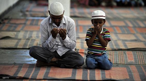 Indian Muslim devotees offers prayers before breaking the breaking of the Ramadan fast with Iftar at the Masjid-E-Syedna-Omar Farooq in Hyderabad on July 1, 2015. Muslims globally mark the month of Ramadan by abstaining from eating, drinking, and smoking as well as sexual activities from dawn to dusk . AFP PHOTO/NOAH SEELAM        (Photo credit should read NOAH SEELAM/AFP/Getty Images)