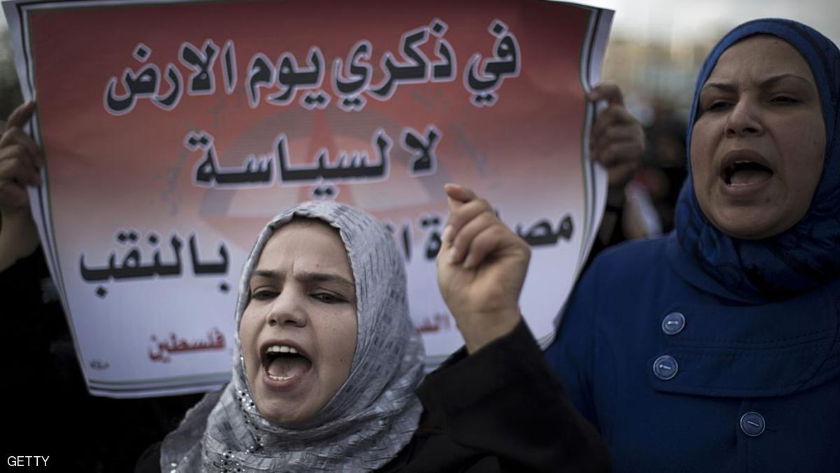 Palestinian women shout slogans during a march to mark "Land Day" on March 30, 2014 near the Israeli border in Jabalia, in the northern Gaza Strip. The Land Day's annual demonstrations mark the deaths of six Arab Israeli protesters at the hands of Israeli police and troops during mass protests in 1976 against plans to confiscate Arab land in the northern Galilee region. AFP PHOTO/MOHAMMED ABED (Photo credit should read MOHAMMED ABED/AFP/Getty Images)