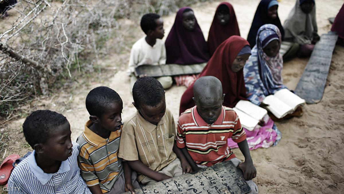 Somali displaced children attend a class at an outdoors makeshift school in Daymarudi Camp 10 December 2007 on the outskirts of Mogadishu. Back-to-back bloody clan battles in Somalia -- now spanning 16 years and worsened by nearly a year of insurgency -- have wiped out basic services in Mogadishu, where the latest clashes Sunday claimed the life of a civilian and wounded three others.  AFP PHOTO/JOSE CENDON (Photo credit should read JOSE CENDON/AFP/Getty Images)