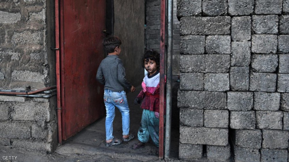 anak-anak-mosul-menghitam-akibat-terkena-asap-hitam-bekas-pemboman-pasukan-pemerintah-syiah-irak