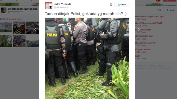 Oknum Polisi Injak Taman Saat Demo 2 Tahun Jokowi-JK, "Media Jamban Gak Ribut"