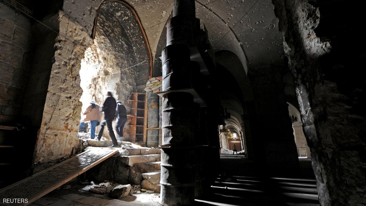 People leave the Umayyad mosque, in the government controlled area of Aleppo, Syria December 17, 2016. REUTERS/ Omar Sanadiki
