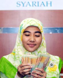 DPR Sahkan RUU Perbankan Syariah Menjadi UU