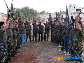 Pejuang Anti Assad Rebut Persimpangan Suriah dan Irak 